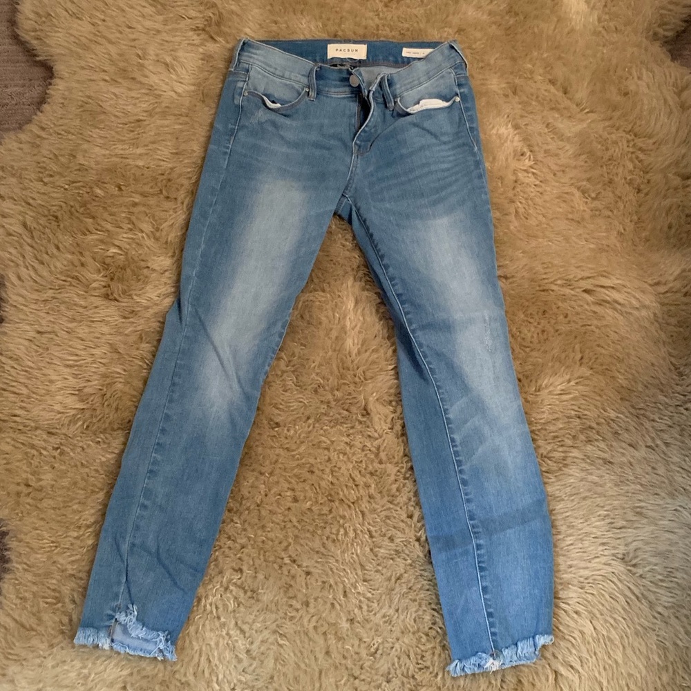 Distressed light wash jeans